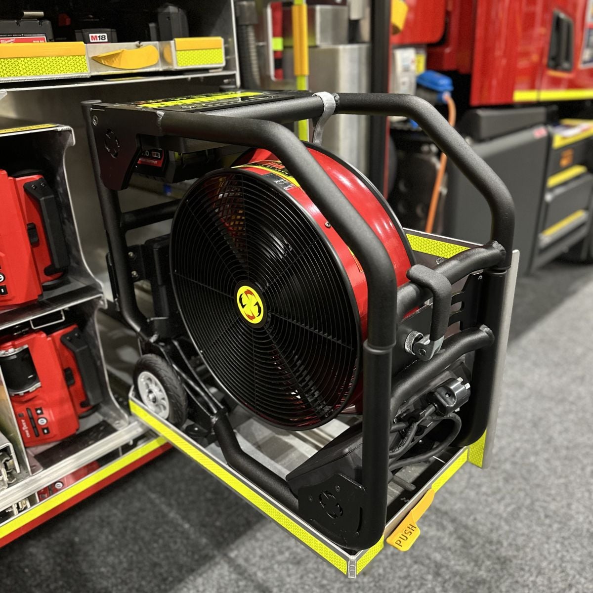 Super Vac V16 battery operated fan stored in fire truck